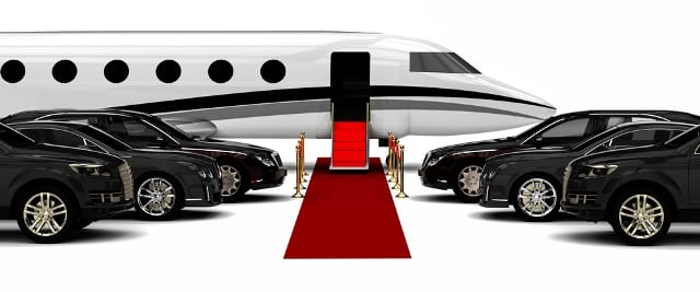 limo hire melbourne fleet's premium cars waiting near red carpet for VIP's to disembark from private jet